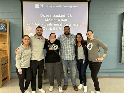 Volunteering with Feed My Starving Children Chicago, 2023